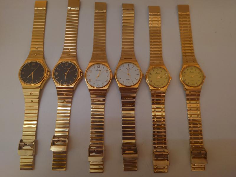 Liquidaciones de stocks de Lote 20 relojes pulsera acero dorados nuevos variados  al por mayor